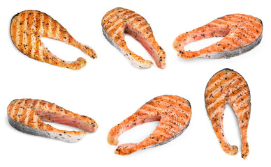 Set with tasty grilled salmon on white background