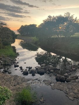 Waterway to the ocean at sunset