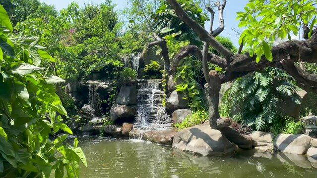 Scene of waterfall in the yard of Khanh An Monastery - The Japanese Temple in Vietnam