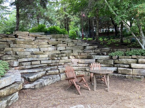 Adirondack chairs in a park