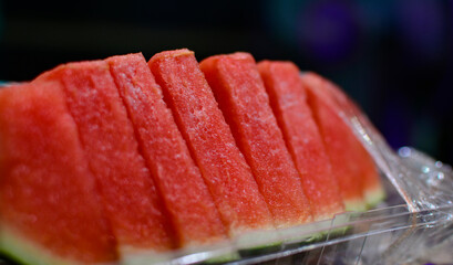 Watermelon is a ripe red fruit that is delicious.
