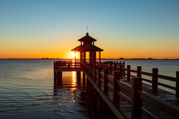 Wooden pavilions by the sea at sunrise in the morning, Sunrise by the sea