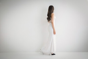 Naklejka premium ドレスを着た女性の後ろ姿 Back style