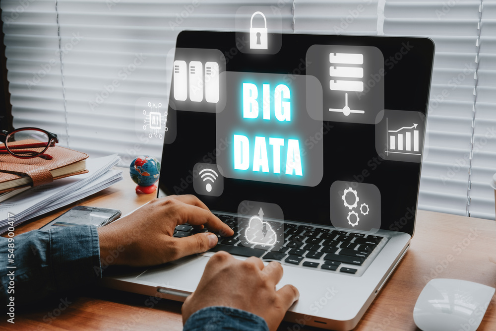 Poster big data concept, person using laptop and smartphone with big data icon on vr screen on office desk.