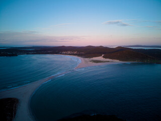 Drone photo of Fingal Bay taken from the Fingal spit, just before sunrise