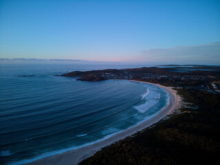 Drone photo of Fingal Bay taken from the Fingal spit, just before sunrise