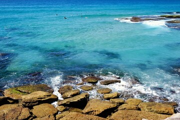 Waves crashing on the rocks along the eastern coastline of Sydney between Bondi and Tamarama Beach...