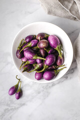 mini eggplant on a light background