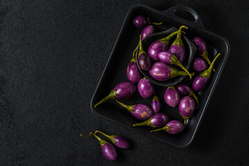 mini eggplant on a black background