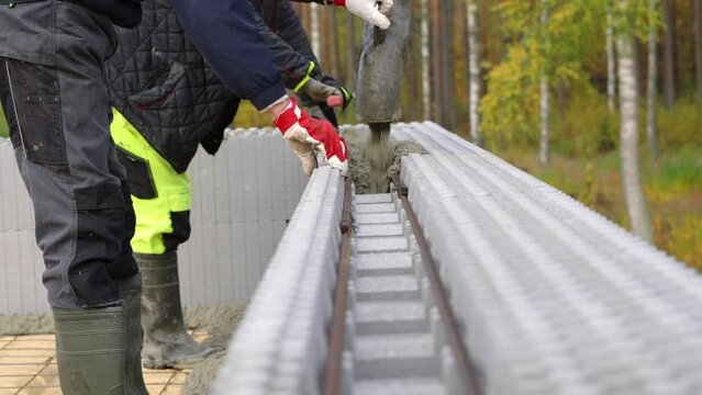 Pouring cement in ICF block