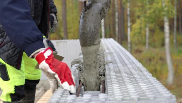 Pouring cement in ICF block