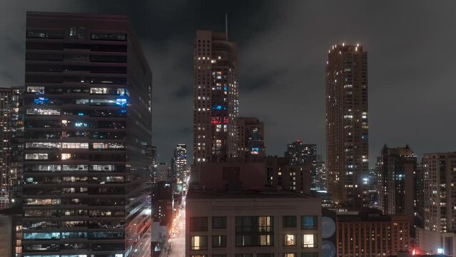 Cloudscape of the central Chicago city skyline at nighttime - time lapse