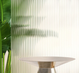 Modern, minimal round silver colored steel table podium with banana tree and reeded glass partition...