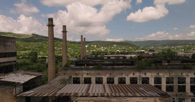 Aerial shot of creepy abandoned factory buildings, prepared for demolishion.