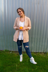 young beautiful woman in a jacket and jeans