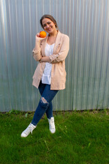 young beautiful woman in a jacket and jeans