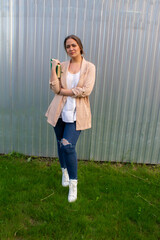 young beautiful woman in a jacket and jeans