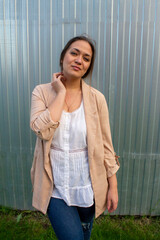 young beautiful woman in a jacket and jeans