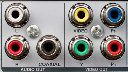 Panel with connectors for connecting audio and video devices. Metal RCA connectors.
