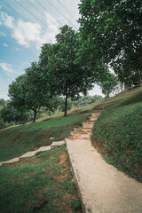 hiking on the concrete path up the hill