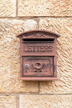 ancient mailbox, letter box on a wall