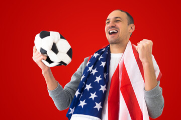 football fan with a deformed crumpled ball and an American flag