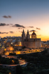 Fototapeta na wymiar Il-Mellieha, Malta, skyline view of Mellieha town after sunset with Paris Church
