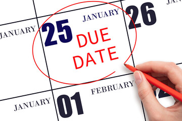 Hand writing text DUE DATE on calendar date January 25 and circling it. Payment due date