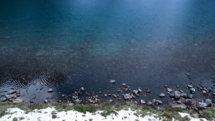 Czarny Staw pod Rysamy or Black Pond lake near the Morskie Oko Snowy Mountain Hut in Polish Tatry...