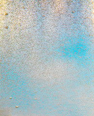 Gas bubbles floating in liquid, gold blue pastel background. Abstract background - boiling water.