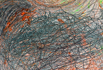 Abstract picture - tangled wire forest fence. Mesh, tangles of tattered wire, coils. 
