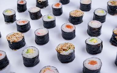  sushi maki rolls on white background