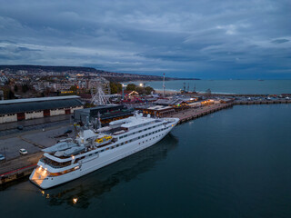Fototapeta na wymiar aerial view of luxury yacht in port at night