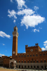 Obraz premium The Palazzo Pubblico is centrally located on the former market square of Siena, the Piazza del Campo, Tuscany, Italy 