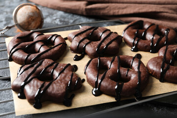 Concept of tasty bakery, gingerbread cookies in chocolate, close up