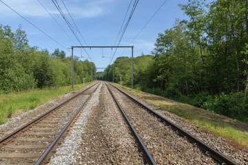 blue sky landscape railway tracks out of city travel perspective transport electric structure trees