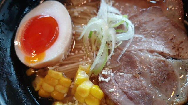 Hokkiado Sapporo butter corn ramen with chashu bbq pork, egg and negi Japanese noodle cuisine