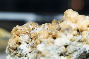 Rock mineral macro photo with white background. sulfur