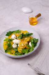 Yellow tomatoes, mozzarella and parsley