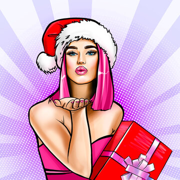 Pop art happy girl with pink hair holding Christmas gift's boxes and gives an air kiss over comic rays background. Portrait of young beautiful woman, retro style stylization of the 50s of 20th century