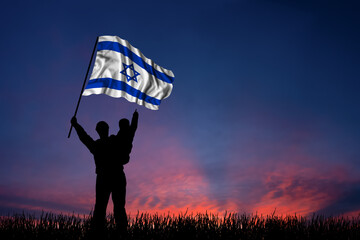 Father and son hold the flag of Israel - 548965230