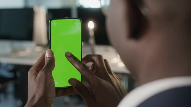 Tap to Click on Centre of Screen. Green Screen and Chroma Key of Smartphone. Businessman Using Smart Phone for Work. Office Worker Connects to Chat or Video Conference. Greenscreen of Chromakey Mock