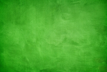 Grunge scratched green cement wall texture background.