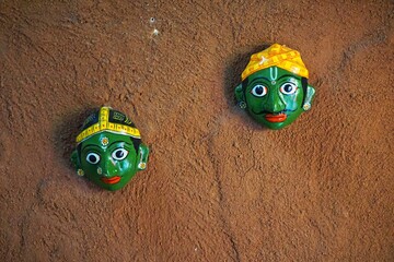 his Cheriyal mask set of a rural couple is handcrafted by artisans from Telangana.