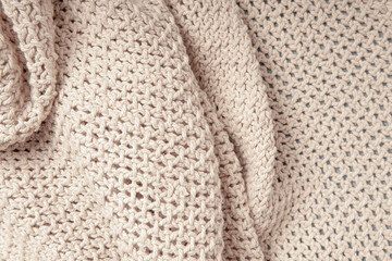 Knitted linen beige canvas background with folds