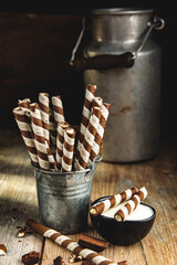Sweet chocolate cream tubes with milk