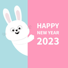 Happy Chinese New Year 2023. The year of the rabbit. White bunny holding big signboard. Cute cartoon funny animal hiding behind paper. Flat design. Typography print. Blue background.
