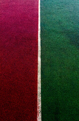 White dividing line between two areas of the sports field.