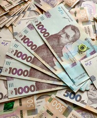 Money of Ukraine. Ukrainian hryvnia bills. UAH banknotes. 1000 hryvnia. Business, finance, news background.  Financial concept