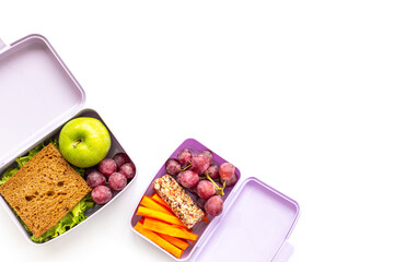 Kid school lunch box set of fruits and vegetables, top view